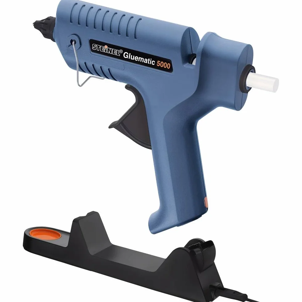 Steinel Pistola per colla a caldo Gluematic 5000 - Pistola termica cordless con stazione di ricarica, vaschetta per gocce, incl. 5 stick colla 11 mm e 2 ugelli